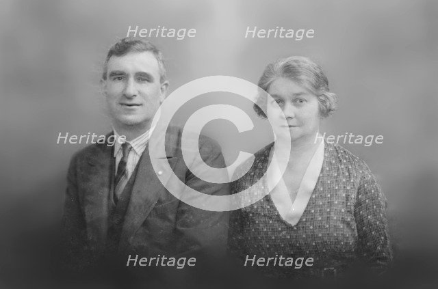 Portrait of a man and woman, c1935. Creator: Kirk & Sons of Cowes.