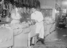 Butchers idle at meat counter during meat boycott, 1910. Creator: Bain News Service.