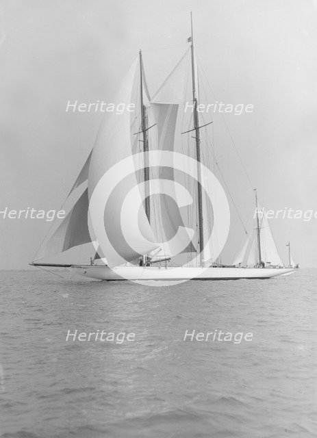 The 380 ton A Class schooner 'Margherita' sailing under spinnaker, 1913. Creator: Kirk & Sons of Cowes.