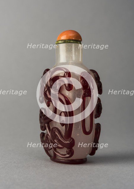 Clear glass snuff bottle with red overlay, China, Qing dynasty, 1644-1911. Creator: Unknown.