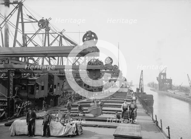 Unloading ore at Conneaut, Ohio, Brown conveying hoists, between 1900 and 1906. Creator: Unknown.