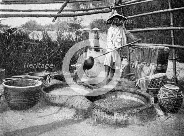 Clarifying sugar cane juce, Annam, Vietnam, 1922. Artist: Unknown