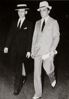J Edgar Hoover, chief of the FBI, with head of the Chicago office Melvin Purvis, USA, mid 1930s. Artist: Unknown