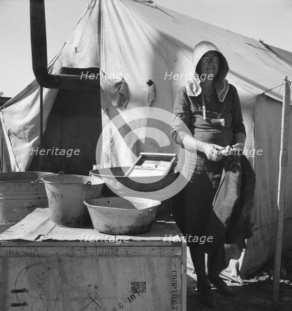 Texas woman in carrot pullers' camp, Imperial Valley, California, 1939. Creator: Dorothea Lange.