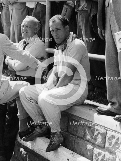 Stirling Moss at the British Grand Prix, Aintree, 1955. Artist: Unknown