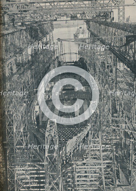 'A Nest of Steel. Cunard White Star liner Georgic in construction, 1927-1929, (1936). Artist: Unknown.