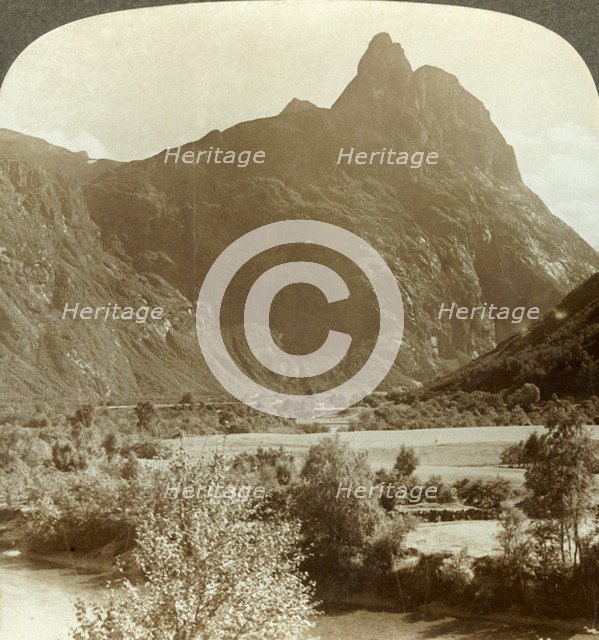 'Sharp pinnacles of Romdalshorn crowning  mountain wall above Rauma river, Norway', c1905. Creator: Unknown.
