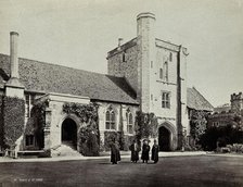 Hospital of Saint Cross, Winchester: four men standing in the courtyard, between 1800 and 1899. Creator: Unknown.