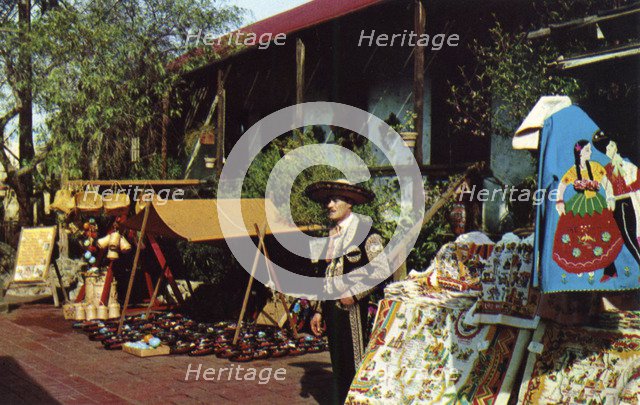 Mexican street merchant, Olvera Street, Los Angeles, California, USA, 1953. Artist: Unknown