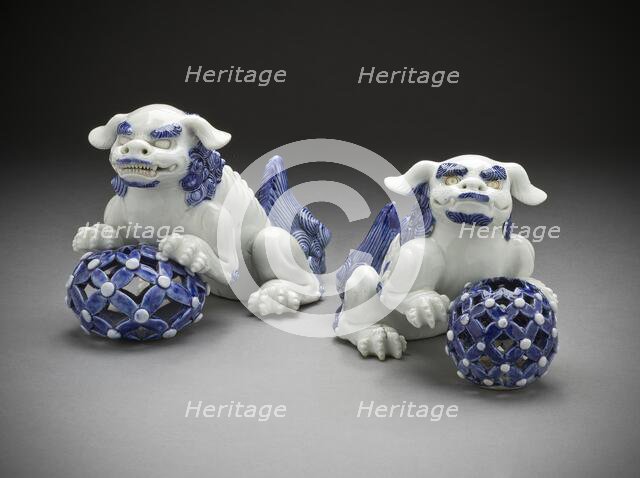Pair of Okimono in the Form of Chinese Lions on Pierced Balls, 19th century. Creator: Unknown.