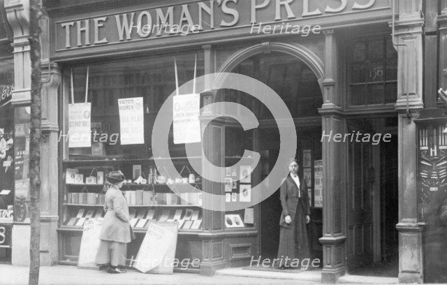 Mrs May looking in the window of the Woman's Press shop, London, 1910. Artist: Unknown