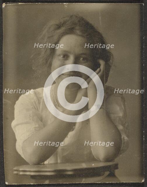 Portrait of a Woman Leaning on Table, 1907-1943. Creator: Louis Fleckenstein.