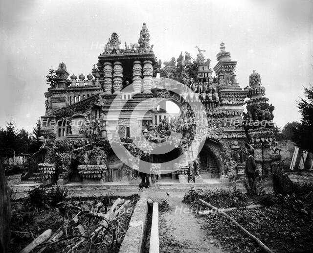 Ferdinand Cheval in front of his Palais Idéal, c. 1890. Creator: Anonymous.