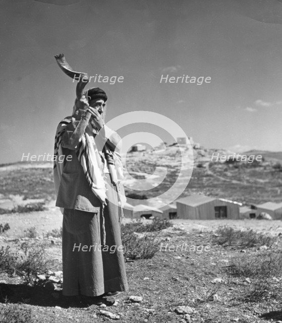 Man sounding a shofar, 1998. Artist: Unknown