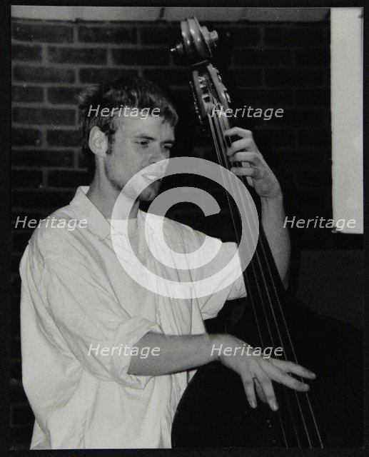 Bassist Ben Haselden playing at The Fairway, Welwyn Garden City, Hertfordshire, 8 April 2001. Artist: Denis Williams