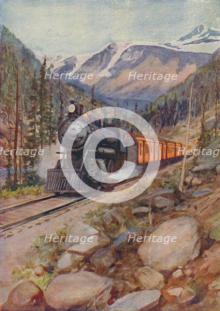 'C.P.R. Train in the Rockies', 1924. Artist: Unknown.