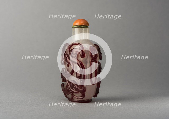 Clear glass snuff bottle with red overlay, China, Qing dynasty, 1644-1911. Creator: Unknown.