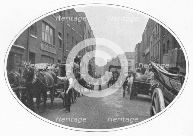 Commencing work, Osborn Street, Whitechapel, London, c1903 (1903). Artist: Unknown.