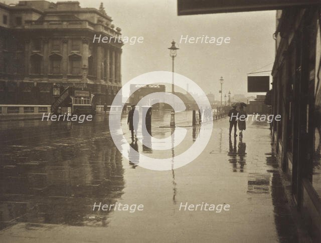 A wet day in Wellington Street. From the album: Photograph album - London, 1920s. Creator: Harry Moult.