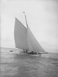 The cutter 'Nanette' sailing close-hauled, 1911. Creator: Kirk & Sons of Cowes.