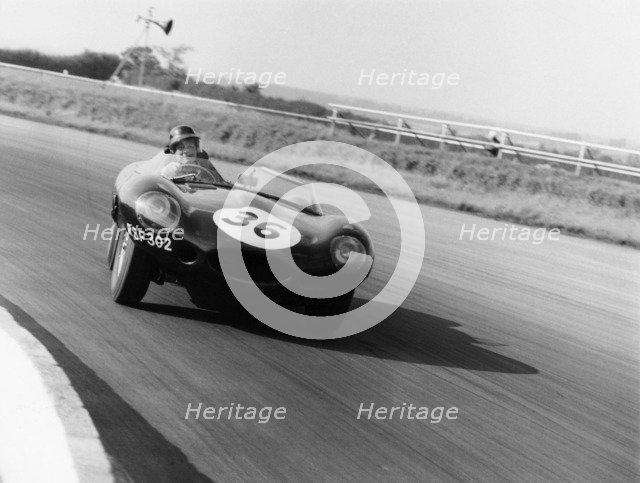 Jaguar D Type, Silverstone, 1961. Artist: Unknown
