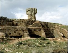 Celtiberian Roman rock city of Tiermes, detail of the rock digged houses, with the Roman baths at…