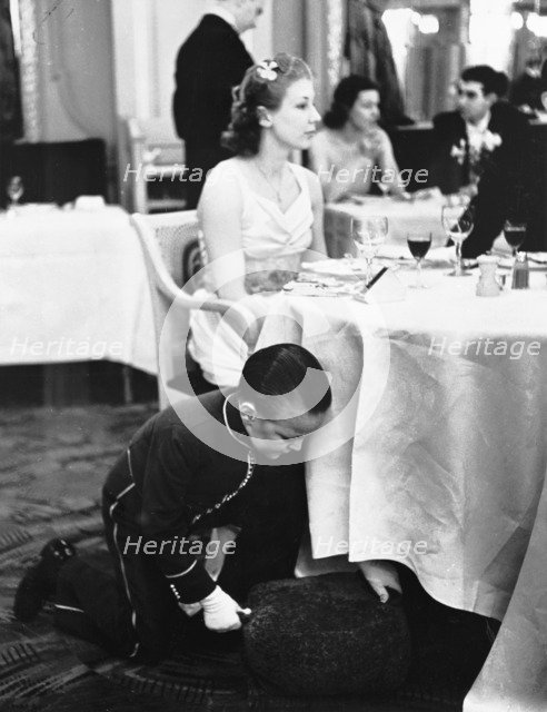 Young boy working at the Trocadero Restaurant, Leicester Square, Westminster, London, 1939. Artist: Unknown