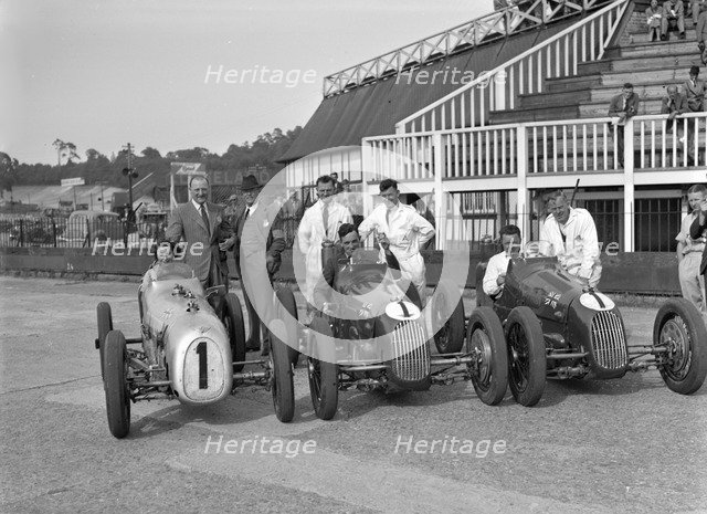 Austin 7 works team, Brooklands 1937. Artist: Bill Brunell.