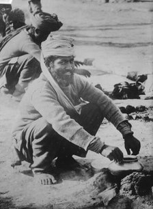 Indian soldier cooking, in France, between c1914 and c1915. Creator: Bain News Service.