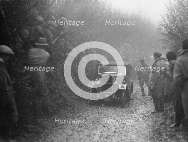 Triumph saloon of CH Lawford competing in the MCC Exeter Trial, 1930. Artist: Bill Brunell.