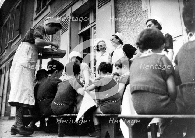 Children at a home run by the German Ministry of Health, World War II, 1939-1945. Artist: Unknown