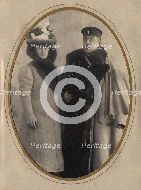 Fire Chief A. F. Domishkevich in the Winter Uniform of a Firefighter (With His Wife), 1901. Creator: N. A. Lavrov.