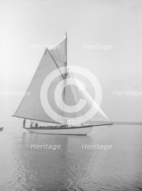 The cutter 'Wenda' in light winds, 1912. Creator: Kirk & Sons of Cowes.