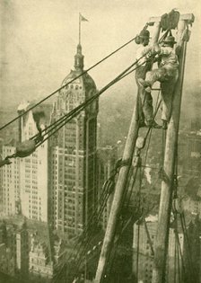 'Crane Men at Work on a New York Skyscraper', c1930. Creator: GPA.