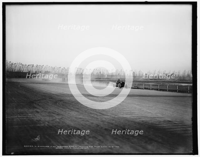 H.S. Harkness in his Mercedes-Simplex, winning five-miles event...Grosse Pointe track...c1902. Creator: Unknown.