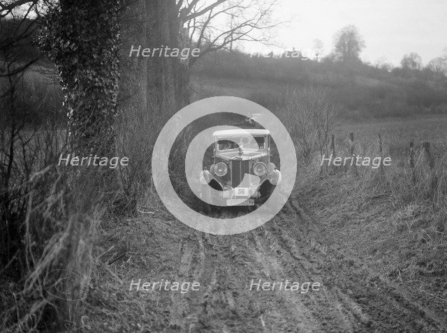MG 18/80 saloon of R Gough competing in the MG Car Club Trial, Kimble Lane, Chilterns, 1931. Artist: Bill Brunell.