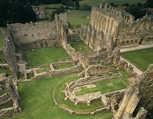 A birds-eye view of buildings around the cloister at Rievaulx Abbey, North Yorkshire, 1994. Artist: Paul Highnam