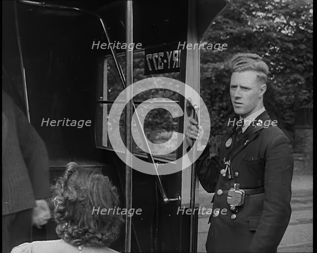 Bus conductor, 1940. Creator: British Pathe Ltd.
