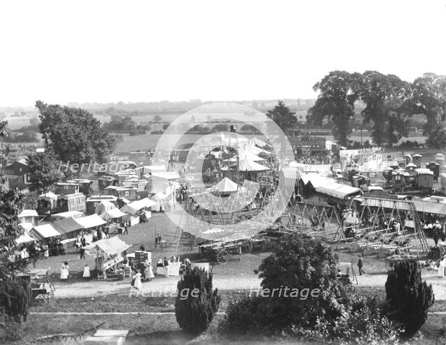 General view of Witney Fair from St Mary's Church tower, West Oxfordshire, Oxfordshire, 1860-1922. Creator: Henry Taunt.