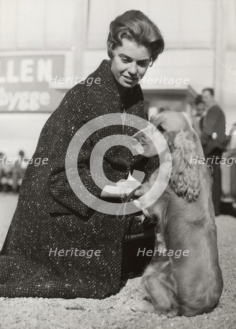 Princess Margaretha of Sweden with her Cocker Spaniel at a dog show, Stockholm, October 1960. Artist: Unknown
