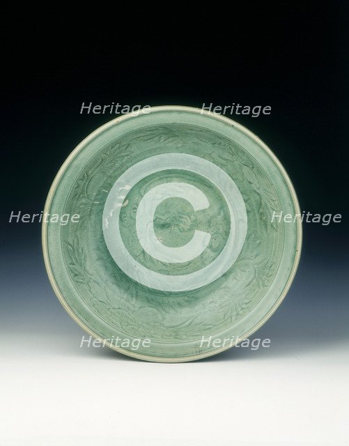Shichikan celadon dish with phoenix and peonies, Ming dynasty, China, 16th century. Artist: Unknown