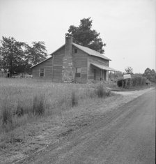 Tobacco sharecropper's house...Whitfield family, near Gordonton, North Carolina, 1939. Creator: Dorothea Lange.