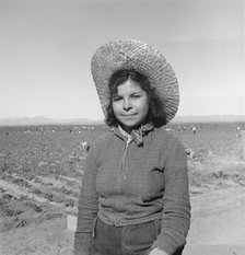 Mexican girl who picks peas for the eastern market, Imperial Valley, California, 1939. Creator: Dorothea Lange.
