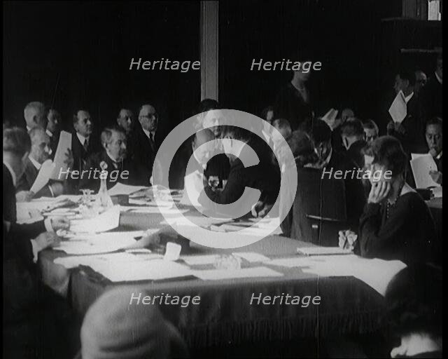 Male Swiss Civilians and Female Swiss Civilians at a Meeting of the League of Nations in..., 1920s. Creator: British Pathe Ltd.