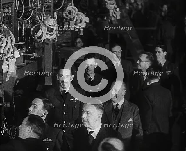 RAF Pilots Touring a Plane Factory, 1942. Creator: British Pathe Ltd.