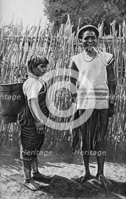 A Moi couple inside the village palisade, Africa, 1922. Artist: Unknown