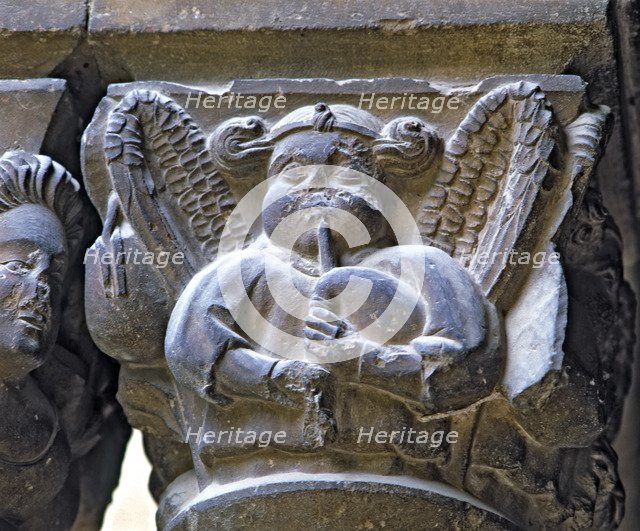 Capital of one of the Gothic galleries of the cloister built between (1387 - 1401) representing a…