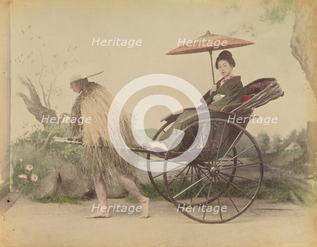 Woman with Parasol Posed Being Pulled in a Jinrikisha by a Man Wearing a Straw Rain Coat,1870s-1890s Creator: Kusakabe Kimbei.