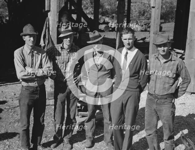 Possibly: Men working in mill, Ola self-help sawmill co-op, Gem County, Idaho, 1939. Creator: Dorothea Lange.