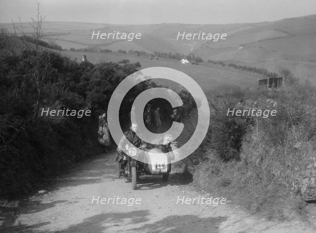 990 cc AJS and sidecar of M Laidlaw at the MCC Lands End Trial, Beggars Roost, Devon, 1936. Artist: Bill Brunell.